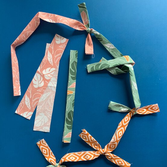 KnottedFabricPom-PomBunting_Step4.jpg?sw=554&q=85