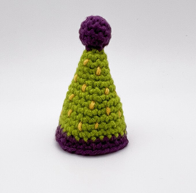 How-to-Crochet-an-Amigurumi-David-Attenborough_Party%20hat.jpg?sw=680&q=85