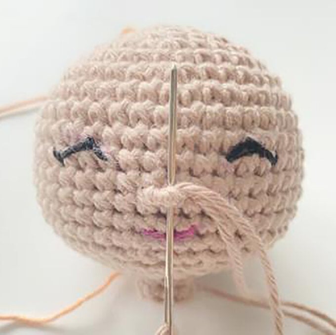 idea_how-to-crochet-amigurumi-mrs-claus_face2.jpg?sw=680&q=85