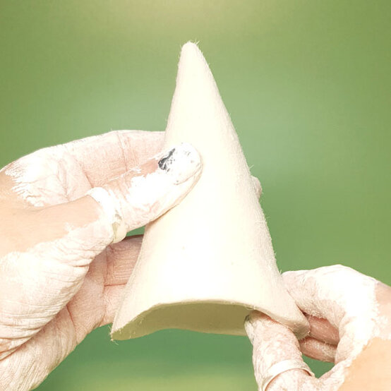 how-to-make-an-air-dry-clay-christmas-gnome_step-2d.jpg?sw=554&q=85