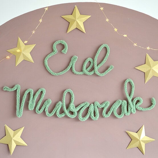 craft-projects-for-eid%20-How-to-Make-a-Knitted-Eid-Mubarak-Sign.jpg?sw=554&q=85