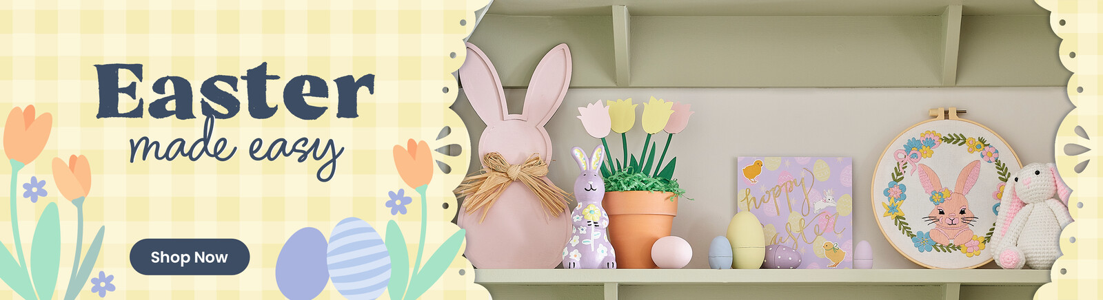 A shelf with easter decorations; painted eggs, paper flowers and ceramic, wooden and crochet bunnies. Header text says Easter made easy, along with a Shop Now button. Clicking leads to easter products.