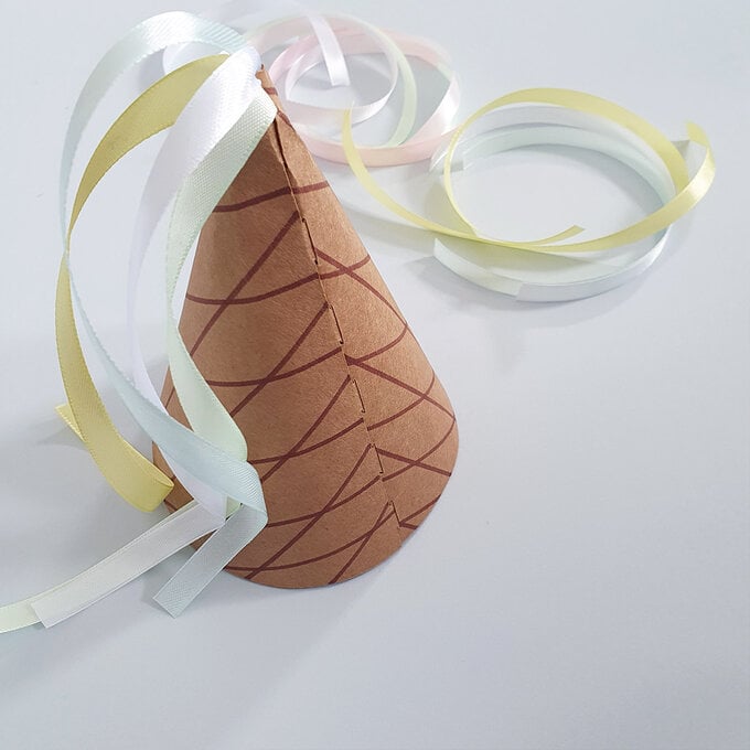 ice-cream-party-hats-wihout-cricut_step-3-cut-ribbons4.jpg?sw=680&q=85