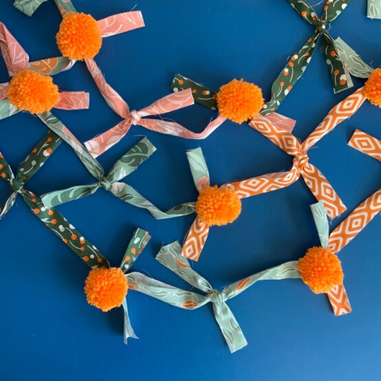 KnottedFabricPom-PomBunting_Step7.jpg?sw=554&q=85