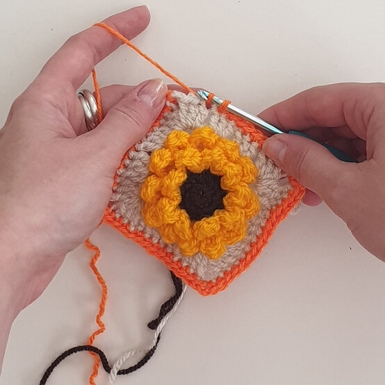 how-to-crochet-an-autumn-dog-coat_granny-square.jpg?sw=554&q=85