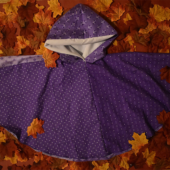 artisan-chloe-hastie-kids-waterproof-poncho.jpg?sw=554&q=85