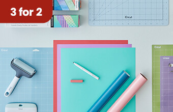 An overhead shot of cutting mats, vinyl and tools, with a 3 for 2 badge. Clicking leads to digital cutting offers.