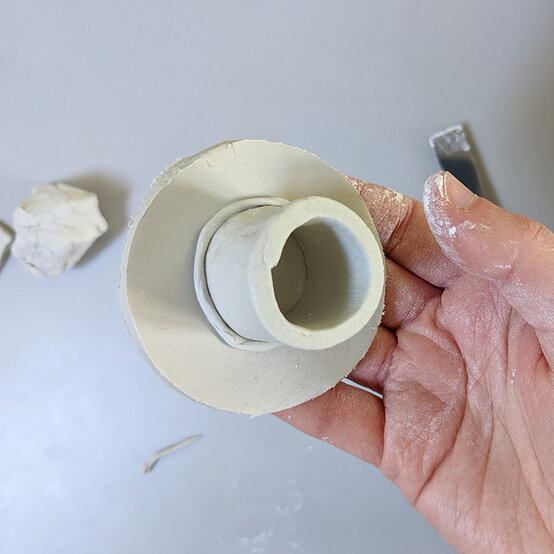 how-to-make-an-air-dry-clay-candle-holder_5.jpg?sw=554&q=85