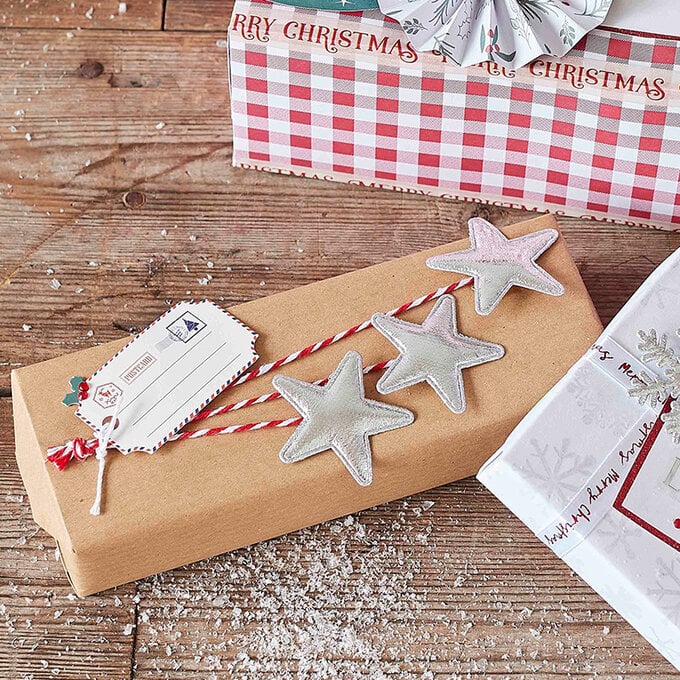 three-ways-to-make-handmade-christmas-gift-wrap_christmas-gift-wrap_embellished-gift-wrap.jpg?sw=680&q=85