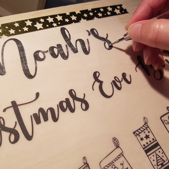 pyrography-christmas-eve-box-3a.jpg?sw=554&q=85