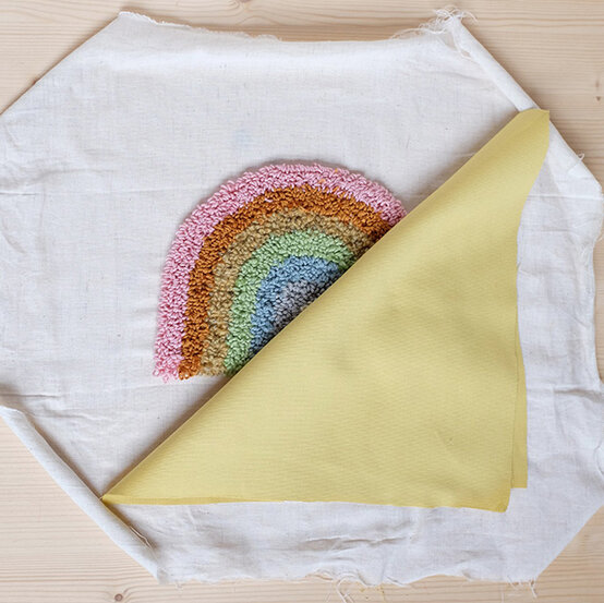 rainbow_punch_neddle_cushion7.jpg?sw=554&q=85