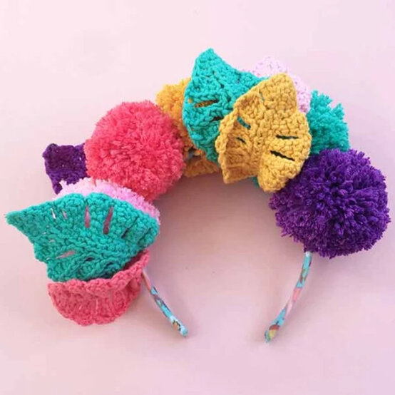 pom-pom-headdress.jpg?sw=554&q=85