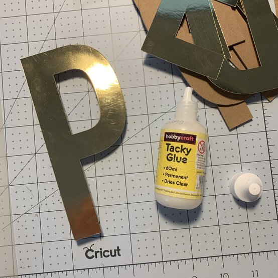 cricut_how-to-make-pride-paper-wall-art_step8.jpg?sw=554&q=85