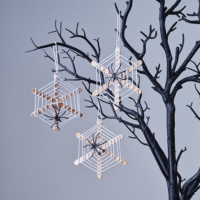 ways-to-decorate-a-twig-tree-for-halloween-spiders-web.jpg?sw=680&q=85