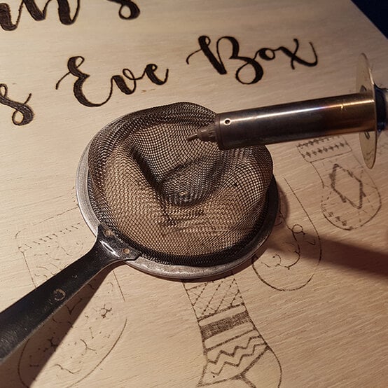 pyrography-christmas-eve-box-6c.jpg?sw=554&q=85