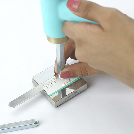 impressart-metal-stamping-cuff-2.jpg?sw=554&q=85