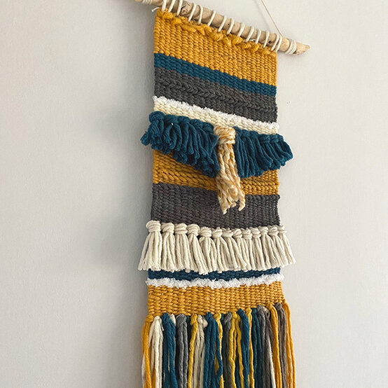 artisan-nicola-brooks-teal-yellow-wall-hanging.jpg?sw=554&q=85