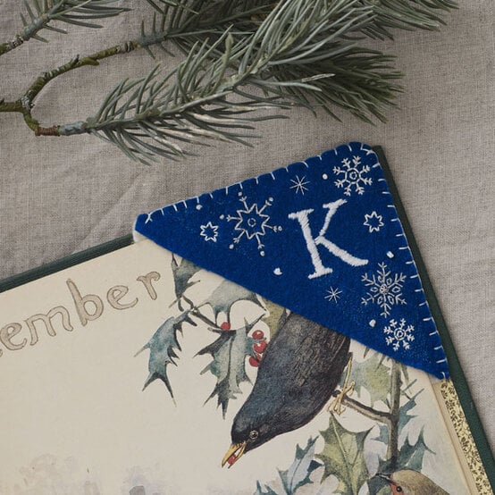 how-to-make-embroidered-bookmarks_snowflake-bookmark.jpg?sw=554&q=85