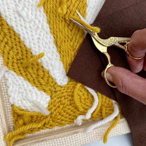 how-to-make-punch-needle-filling_section-tidying_back-step_14.jpg?sw=554&q=85