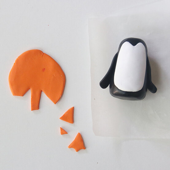 how-to-make-fimo-snow-globes_penguin-4.jpg?sw=554&q=85