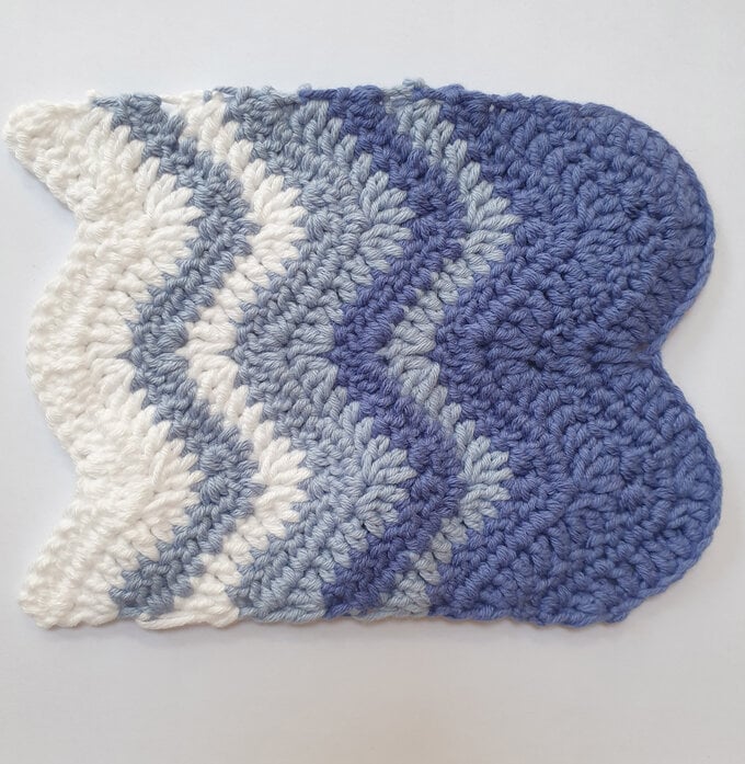 how_to_crochet_an_under_the_sea_wreath_hero_wave-blanket.jpg?sw=680&q=85