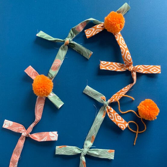 KnottedFabricPom-PomBunting_Step6.jpg?sw=554&q=85