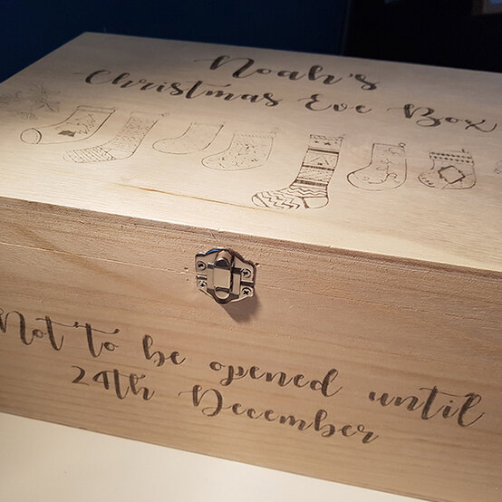 pyrography-christmas-eve-box-5.jpg?sw=554&q=85