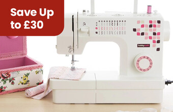 A sewing machine on a table with sewing accessories around it, with the badge Save Up to &pound;30'. Clicking leads to sewing machine offers page