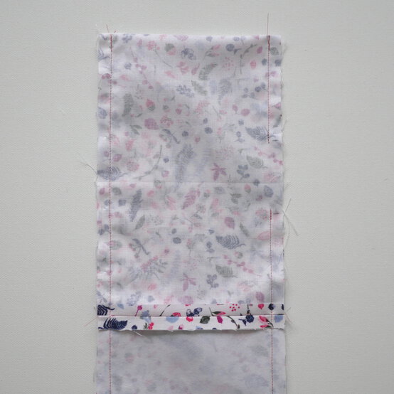 how_to_make_a_buttoned_gift_bag_step-9.jpg?sw=554&q=85