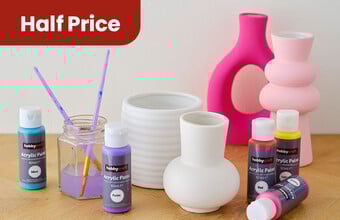 4 ceramic vases, 5 paint bottles and a water jar with 2 paintbrushes. Clicking leads to the products for ceramics.