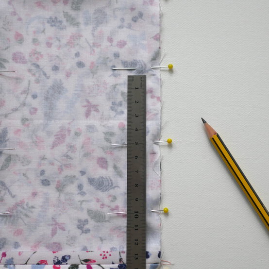 how_to_make_a_buttoned_gift_bag_step-8.jpg?sw=554&q=85