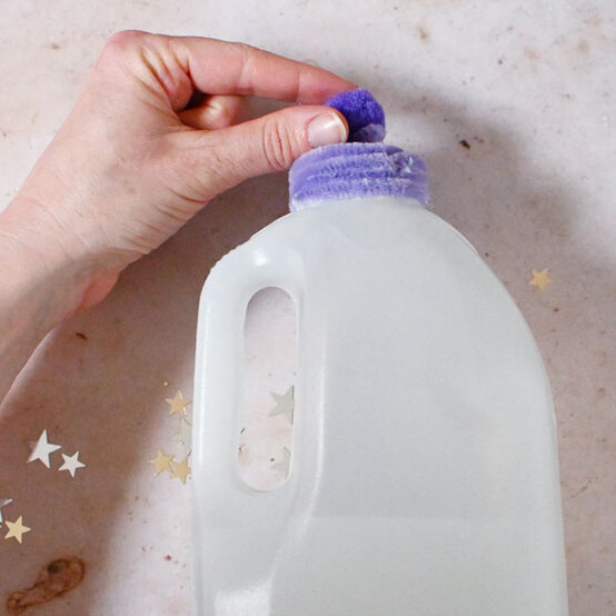 how-to-make-winter-milk-bottle-lanterns_snowman-a.jpg?sw=554&q=85