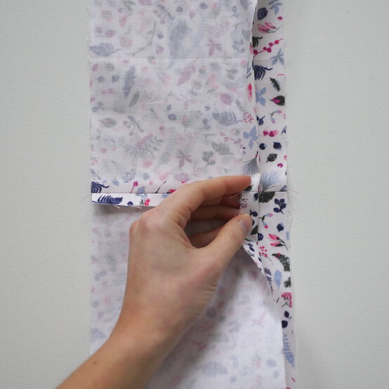 how_to_make_a_buttoned_gift_bag_step-7.jpg?sw=554&q=85