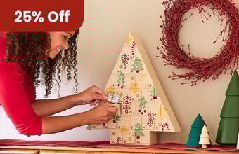 A person putting a small gift into a personalised wooden tree advent calendar. From £7 badge. Clicking leads to advent calendar products.