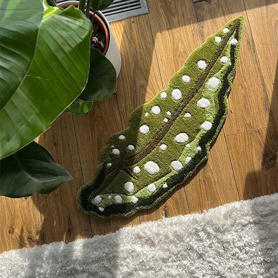 artisan-isabella-oates-tufted-begonia-polka-dot-leaf-rug.jpg?sw=554&q=85