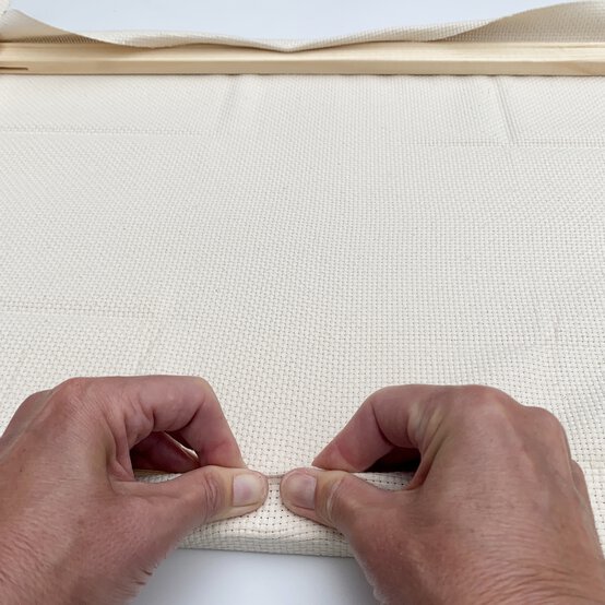 how-to-prepare-a-punch-needle-frame-step_9_opposite_long_side.jpg?sw=554&q=85