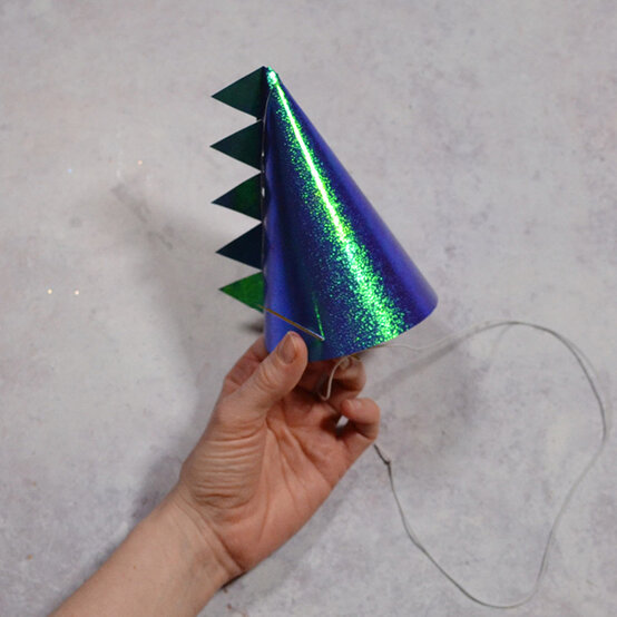 how_to_make_dinosaur_party_hats_craft_activities_step4.jpg?sw=554&q=85