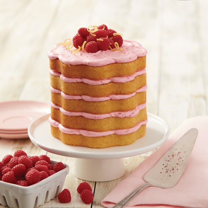 how-to-make-a-lemon-and-raspberry-scalloped-cake.jpg?sw=680&q=85