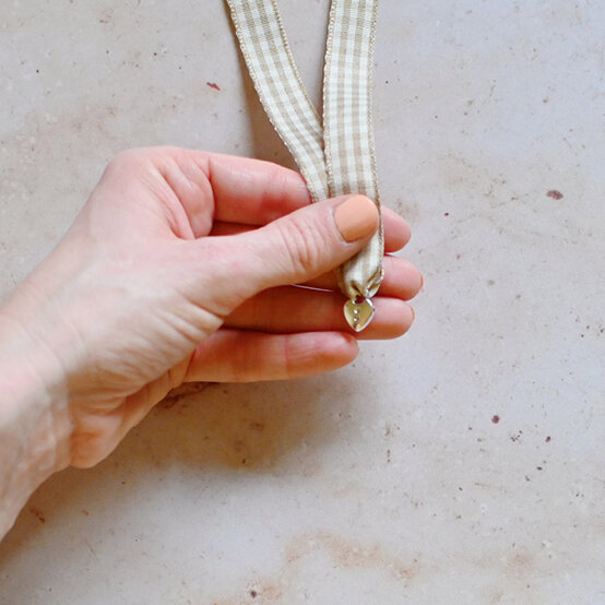 how_to_make_ribbon_charm_bookmarks_7.jpg?sw=554&q=85