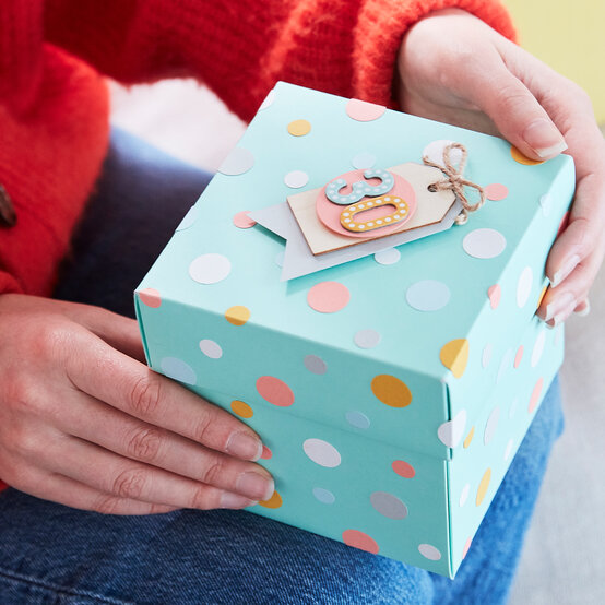 exploding-birthday-scrapbook_hero2.jpg?sw=554&q=85