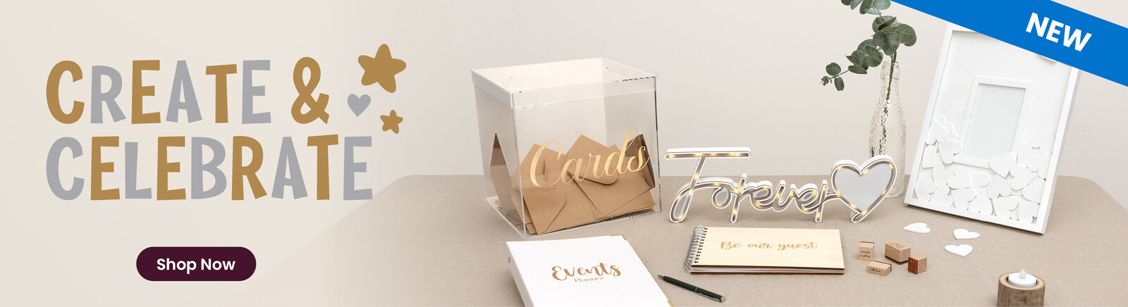 Wedding table decor and stationery. Header text says Create & Celebrate, along with a Shop Now button and a New banner. Clicking leads to Create & Celebrate party and occasions products