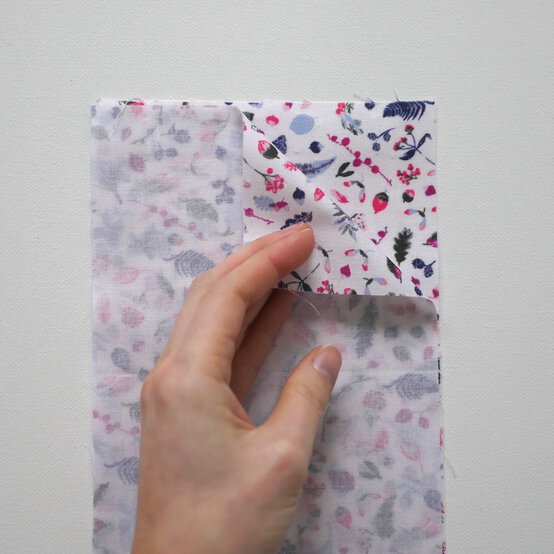 how_to_make_a_buttoned_gift_bag_step-3.jpg?sw=554&q=85