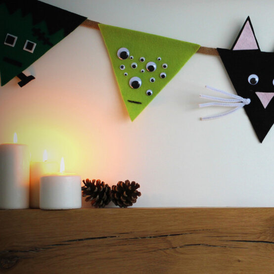 ideas%5Fhow%2Dto%2Dmake%2Dfelt%2Dhalloween%2Dbunting%5Ffinished2.jpg?sw=554&q=85