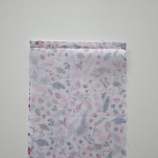 how_to_make_a_buttoned_gift_bag_step-5.jpg?sw=554&q=85