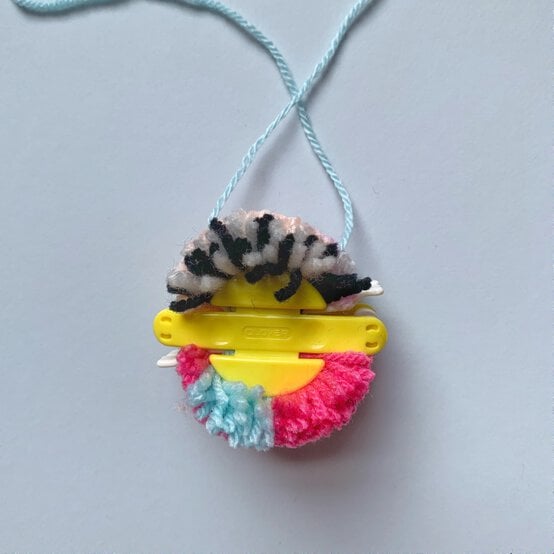 how_to_create_five_different_patterns_in_pom_poms_multi_pattern_pom_pom_step_7.jpg?sw=554&q=85