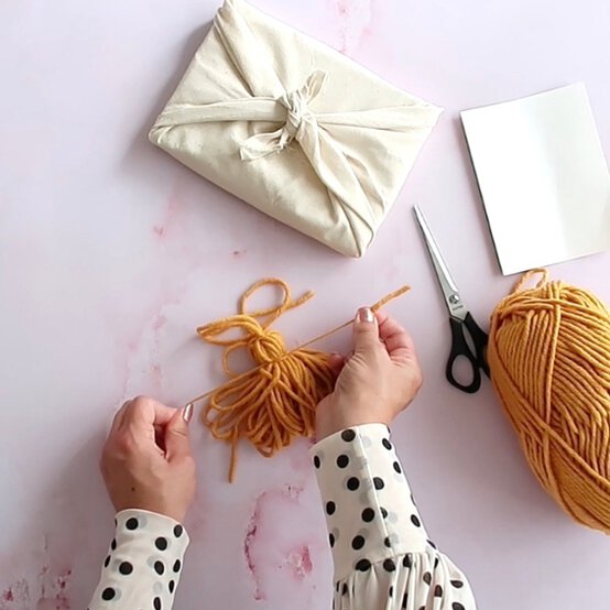 How_to_Gift_Wrap_with_your_yarn_scraps_Furoshiki%207.jpeg?sw=554&q=85