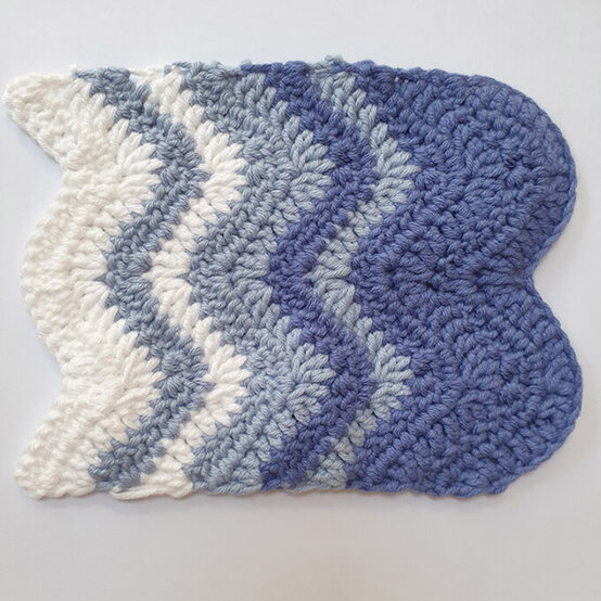 how_to_crochet_an_under_the_sea_wreath_hero_wave-blanket.jpg?sw=554&q=85