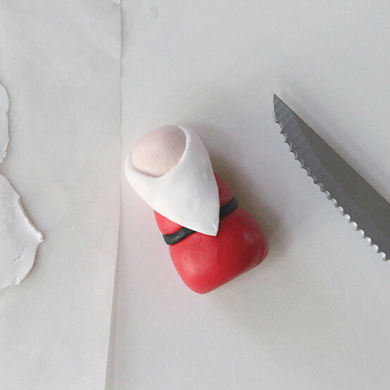 how-to-make-fimo-snow-globes_santa-3.jpg?sw=554&q=85