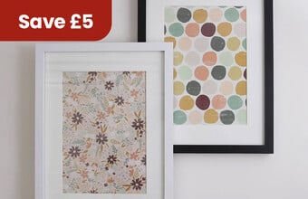 A white and a black picture frame with artwork in them. Save &pound;5 badge. Clicking leads to A4 & A3 picture frame offers.