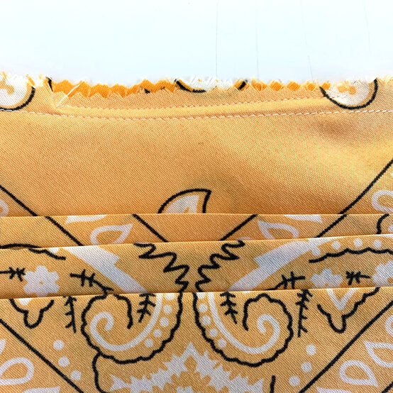 1-how-to-make-a-bandana-face-covering-7b.jpg?sw=554&q=85